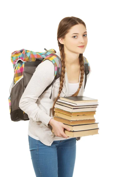 Bella adolescente con zaino e libri . — Foto Stock