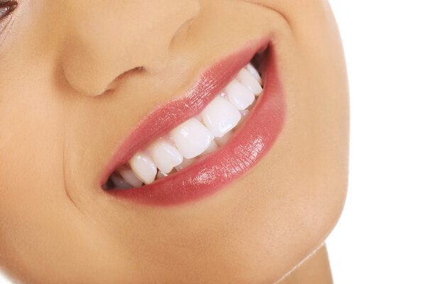 Женский рот с идеальной улыбкой
.