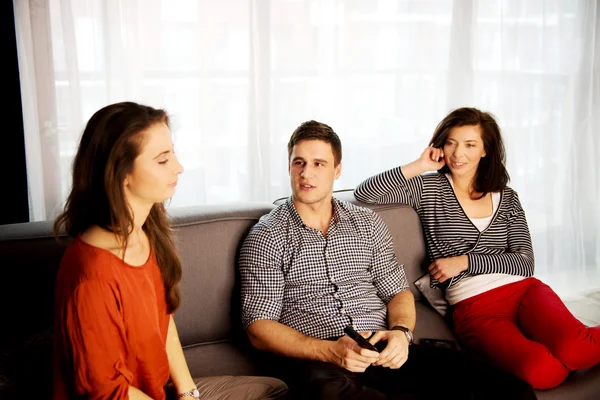 Sisters and brother relaxing at home. — Stock Photo, Image