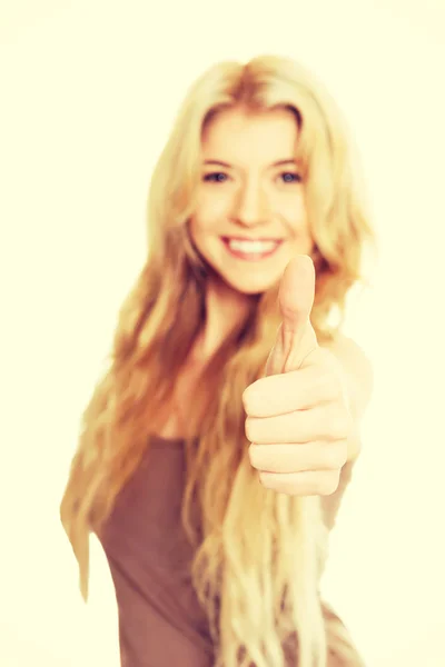 Portrait of student woman showing thumb up — Stock Photo, Image