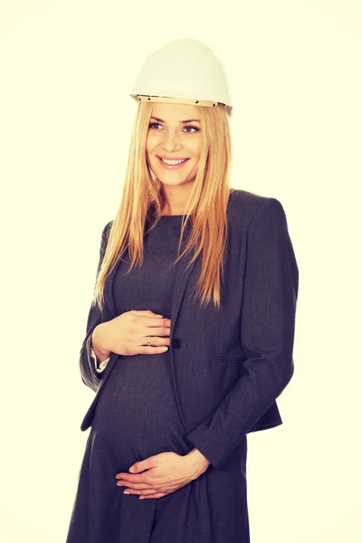 백색 헬멧에 임신한 여자 — 스톡 사진
