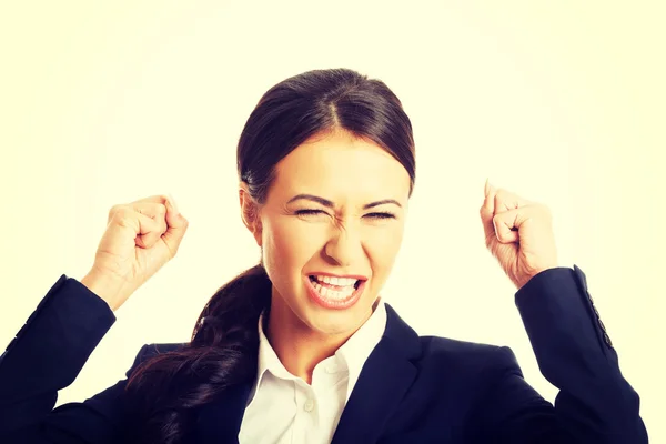 Portrait of angry businesswoman making fists — Stock Photo, Image