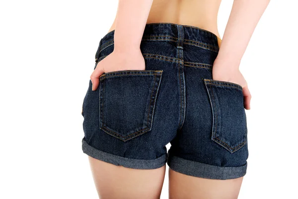 Sexig kvinna i jeans shorts. — Stockfoto