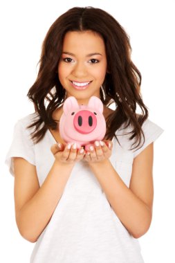 African woman with piggybank. clipart
