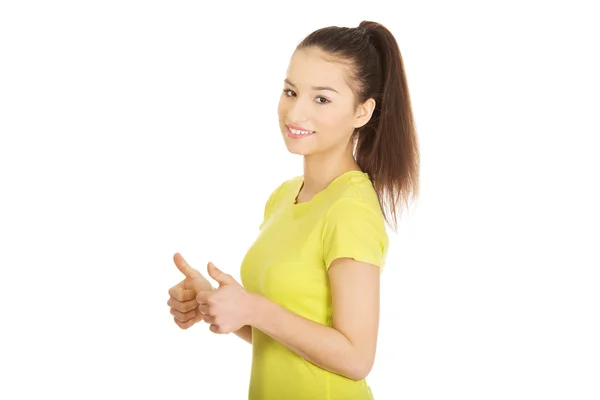 Mujer feliz con los pulgares arriba . — Foto de Stock