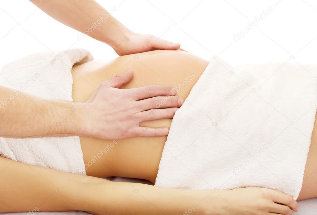 Pregnant woman having a relaxing massage