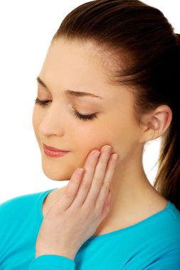 diş ağrısı ile genç kadın.