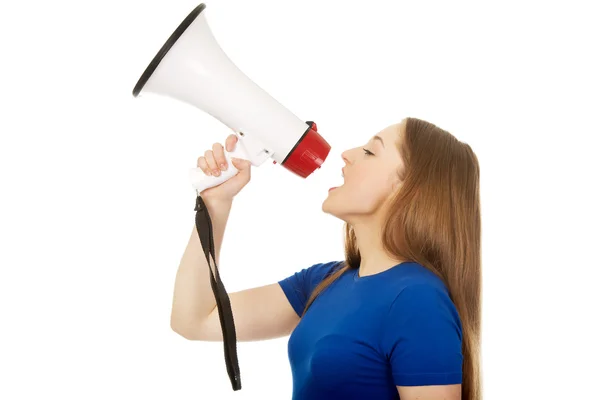 Screaming young woman with megaphone. — Stock Photo, Image