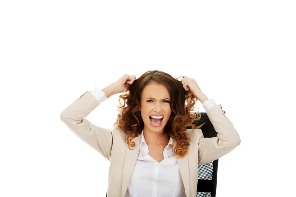 Arg affärskvinna skriker. — Stockfoto