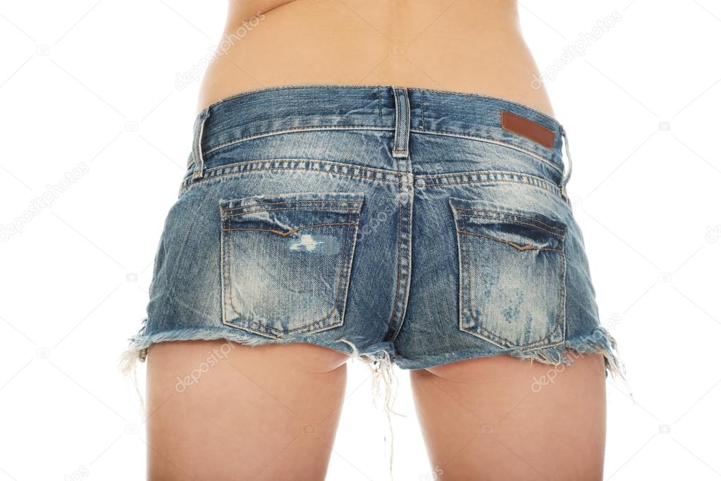 Sexy woman in jeans shorts. 