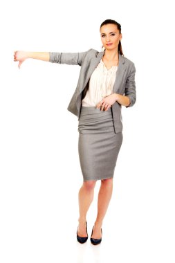 başparmak aşağı gösteren iş kadını.