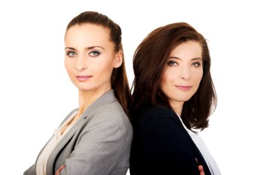 İki işkadını birbirine yaslanmış.