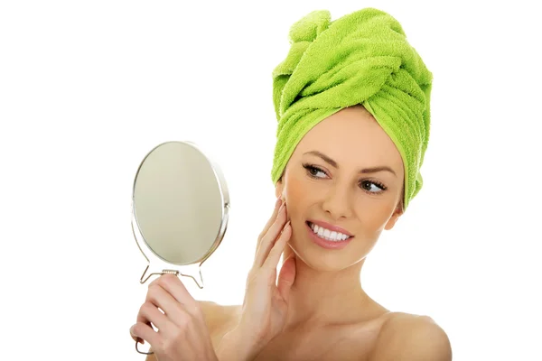 Beautiful woman with a mirror. — Stock Photo, Image