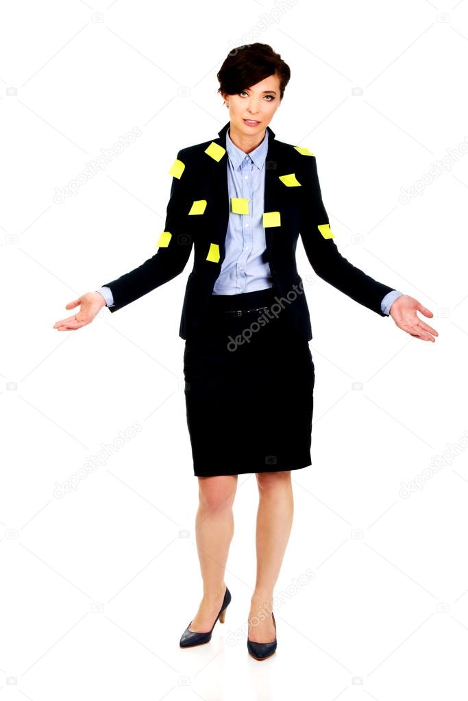 Businesswoman with adhesive cards.