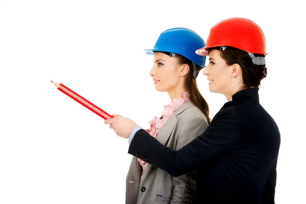 Two architects women discussing. — Stock Photo, Image