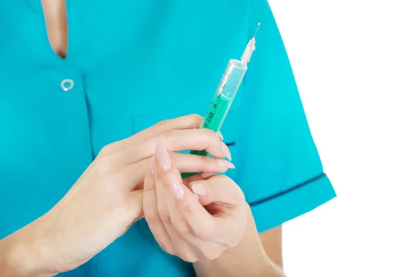 Nurse with a syringe in hand. — Stock Photo, Image