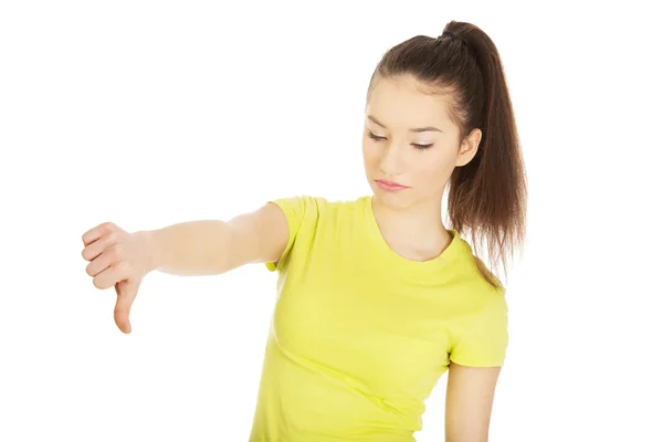 Mujer infeliz con los pulgares abajo . —  Fotos de Stock