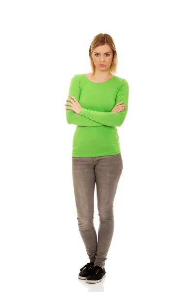 Annoyed woman with arms crossed. — Stock Photo, Image