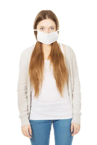 Tiener vrouw met beschermend masker. — Stockfoto
