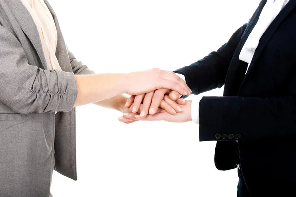 Two businesswomen holding their hands together. — Stock Photo, Image