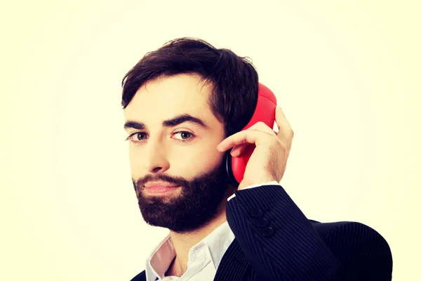 Empresário ouvindo música . — Fotografia de Stock