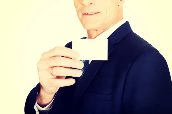 Businessman showing a blank identity name card — Stock Photo, Image