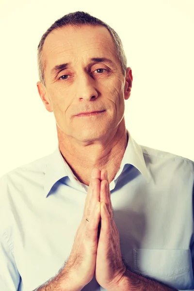 Mature man praying to God — Stock Photo, Image