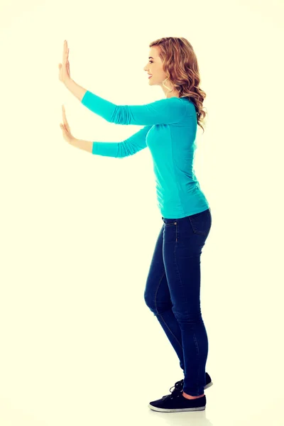 Side view woman touching imaginary screen — Stock Photo, Image