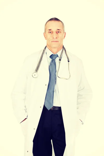 Male doctor with hands in pockets — Stock Photo, Image