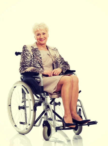 Mature woman in her wheelchair — Stock Photo, Image