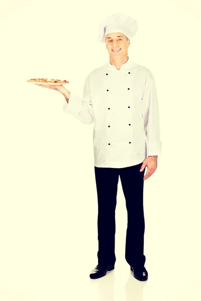 Cocinero panadero con pizza italiana — Foto de Stock