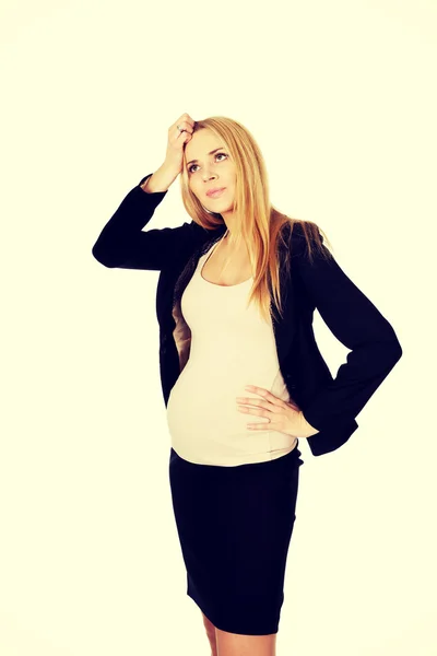 Tired pregnant businesswoman — Stock Photo, Image