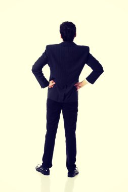 kalça üzerinde el ile iş adamı.