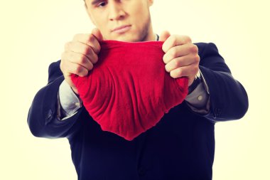 İşadamı gözyaşları kalp yastık şeklinde.