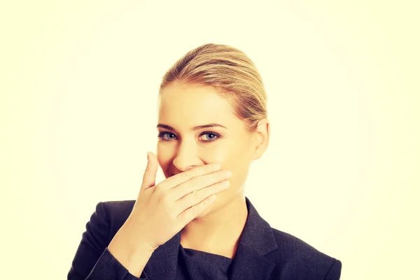 Laughing woman covering her mouth — Stock Photo, Image