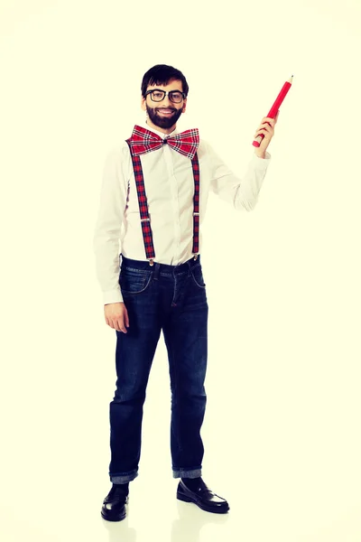 Old fashioned man pointing up with big pencil. — Stock Photo, Image