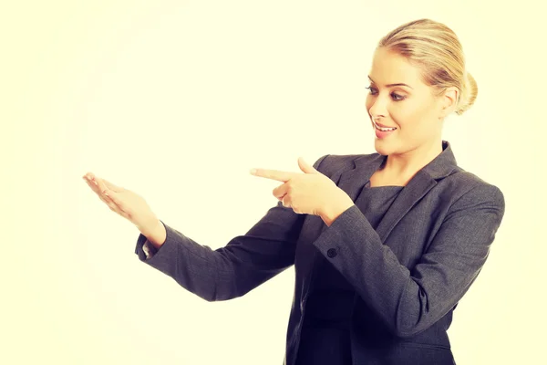 Business woman showing copy space on the left — Stock Photo, Image