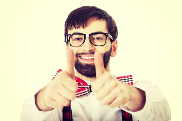 Man wearing suspenders with thumbs up. — Stock Photo, Image