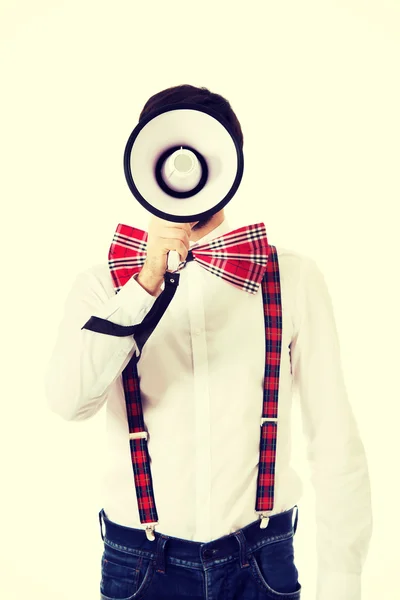 Man wearing suspenders with megaphone. — Stock Photo, Image