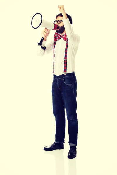 Man wearing suspenders with megaphone. — Stock Photo, Image