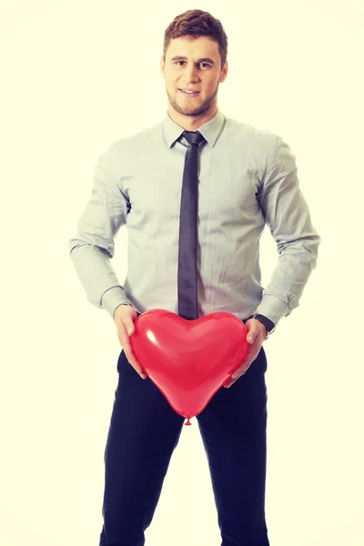 Homem com balão cardíaco . — Fotografia de Stock