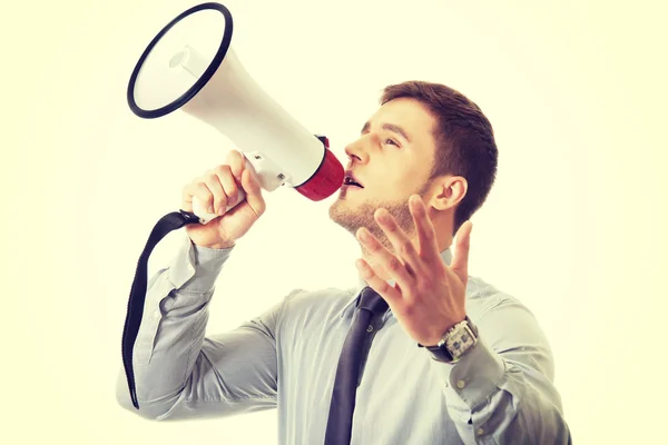 Empresário gritando através de megafone . — Fotografia de Stock