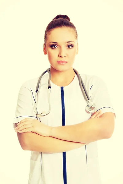 Confident female doctor with folded arms — Stock Photo, Image