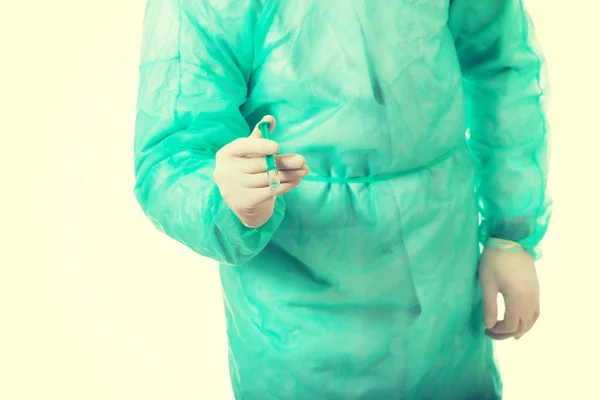 Male doctor holding a syringe. — Stock Photo, Image