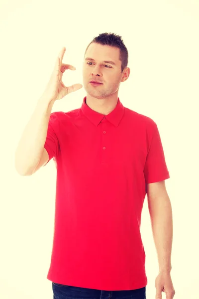 Excited man showing copy space — Stock Photo, Image