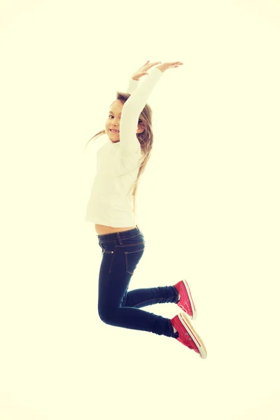 Menina pulando com alegria — Fotografia de Stock