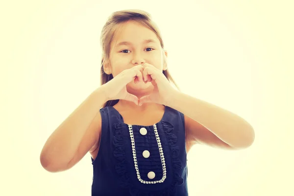 Girl shows hearts on hands — Stock Photo, Image