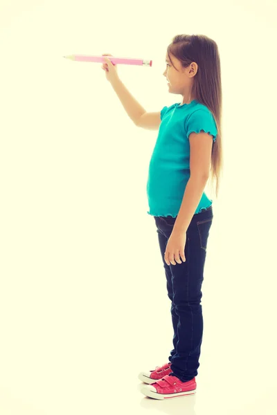 Niña con un lápiz —  Fotos de Stock