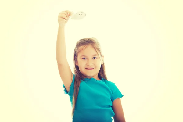 Little girl playing small plane — Stock Photo, Image