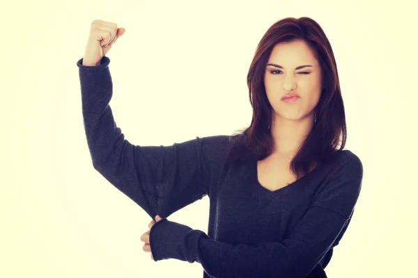 Mujer joven mostrando su fuerza —  Fotos de Stock